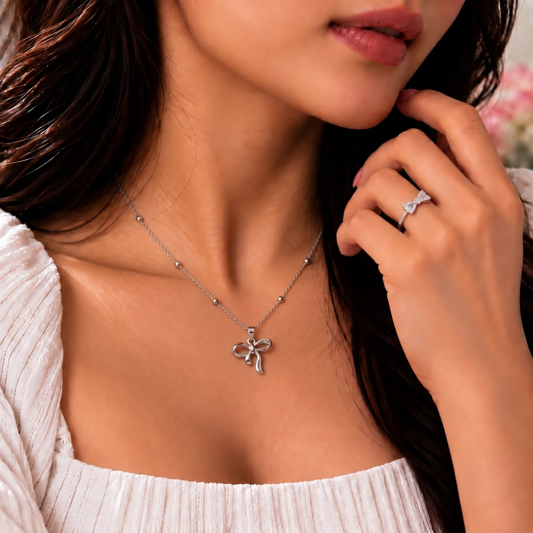 Elegant Silver Bow Pendant Necklace & Crystal Ring Set for Women - Image 2