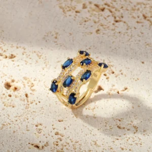 Elegant Gold-Tone Blue Sapphire-Style Statement Ring with Crystal Accents